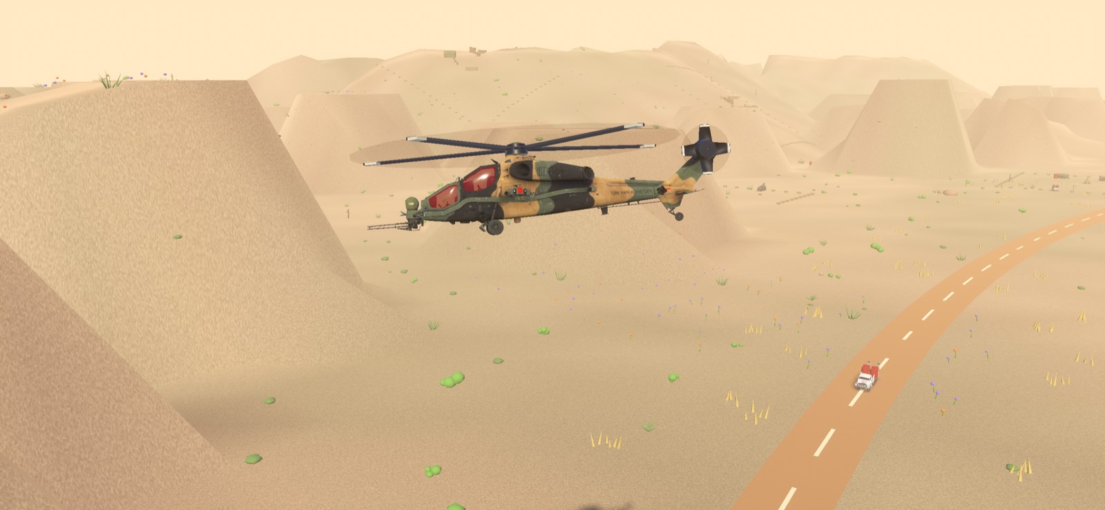 A T-129 ATAK gunship low over a desert ridge, with a highway and a single truck below