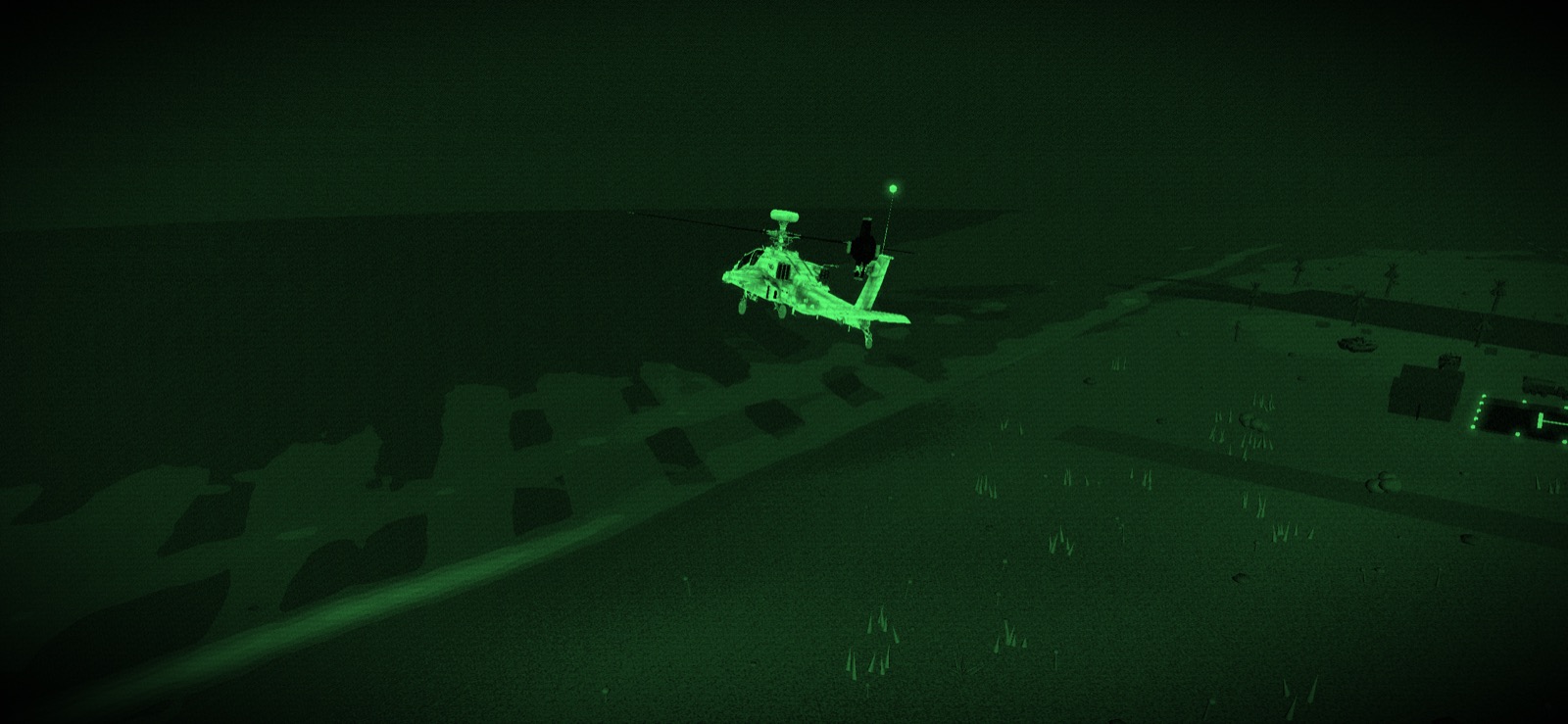 An Apache seen through night vision, glowing green above a dark airfield